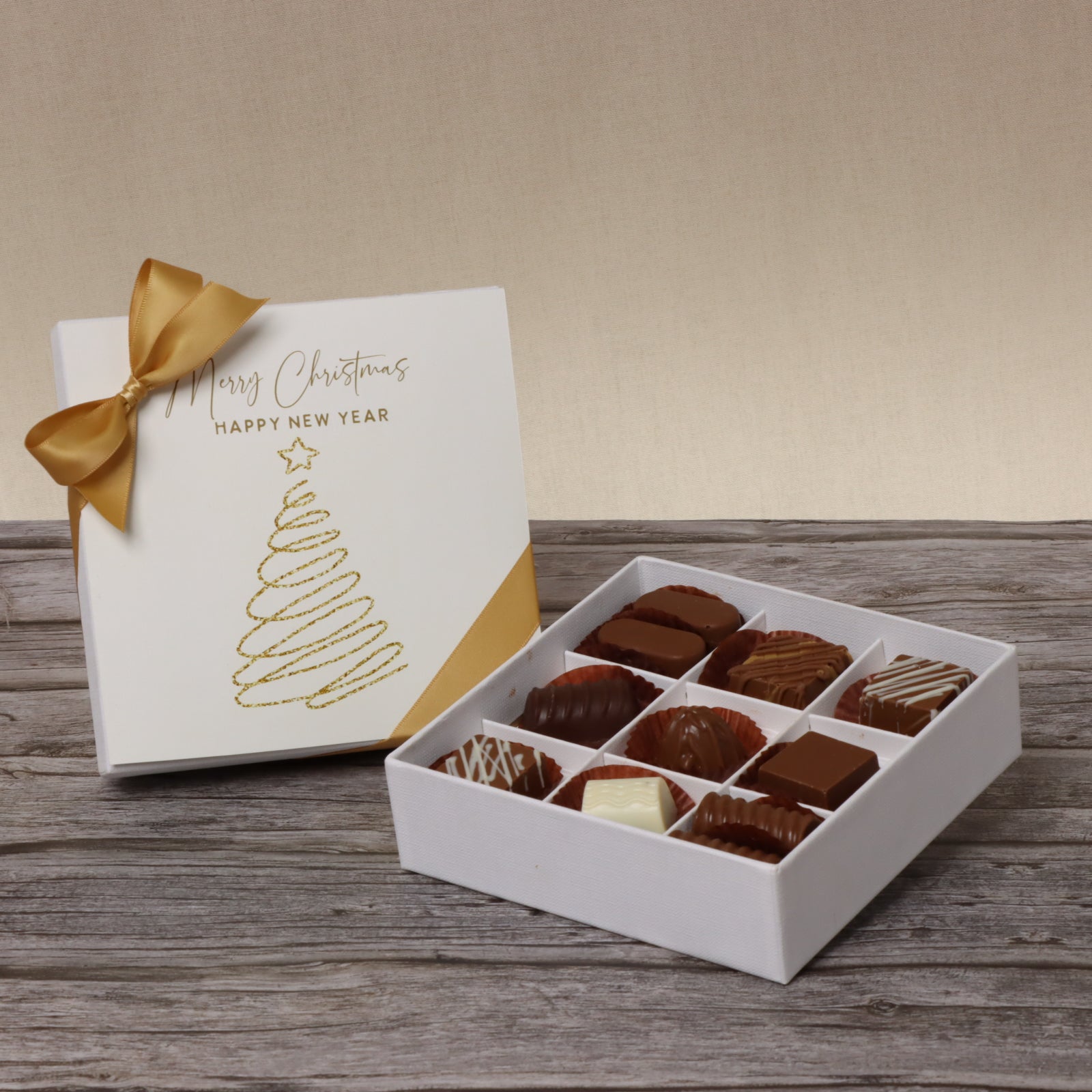 Season's greetings , Merry Christmas & happy new year designed premium chocolate 9 piece hard box
