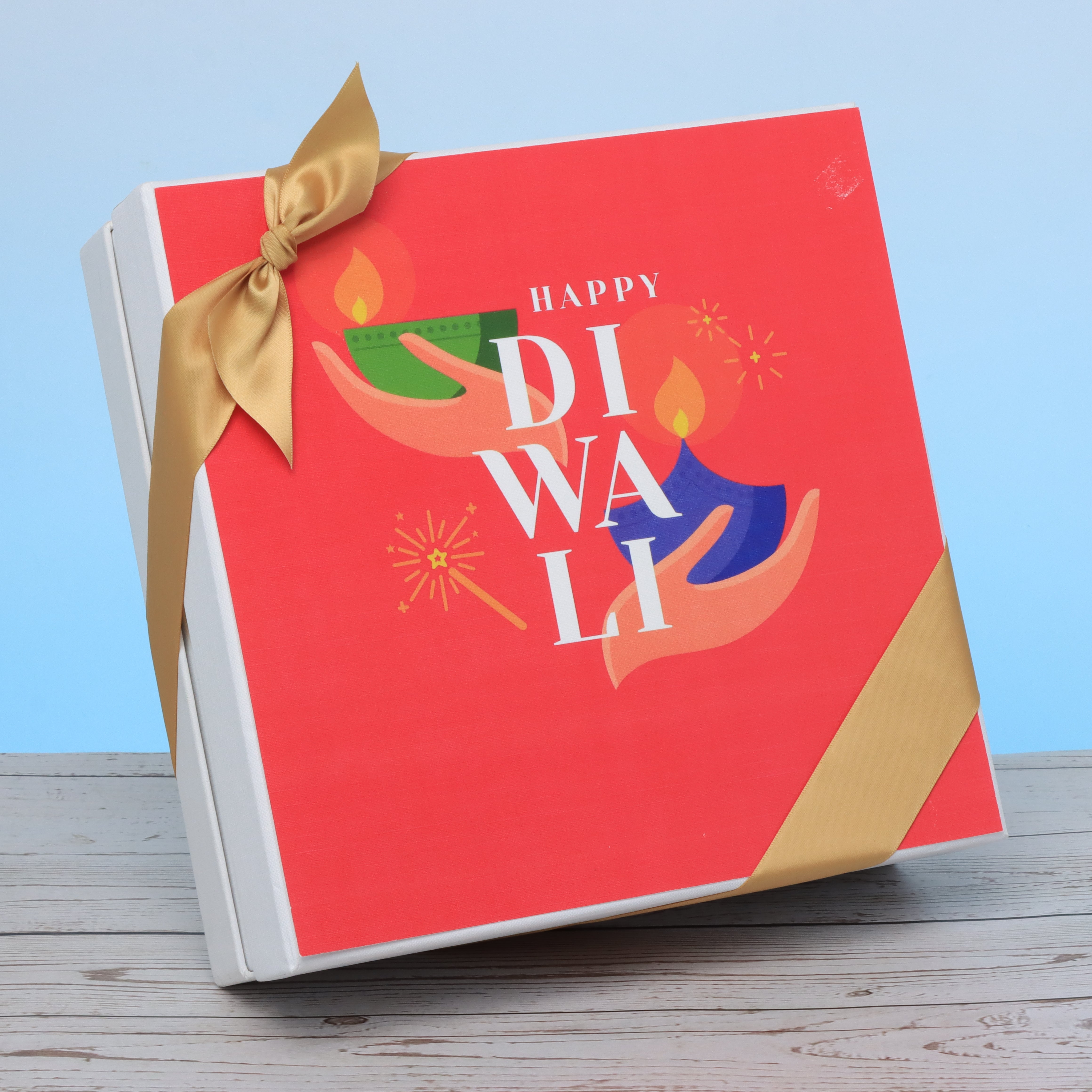 Happy diwali hands holding candle designed premium chocolate hard box