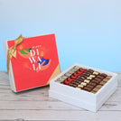Happy diwali hands holding candle designed premium chocolate hard box