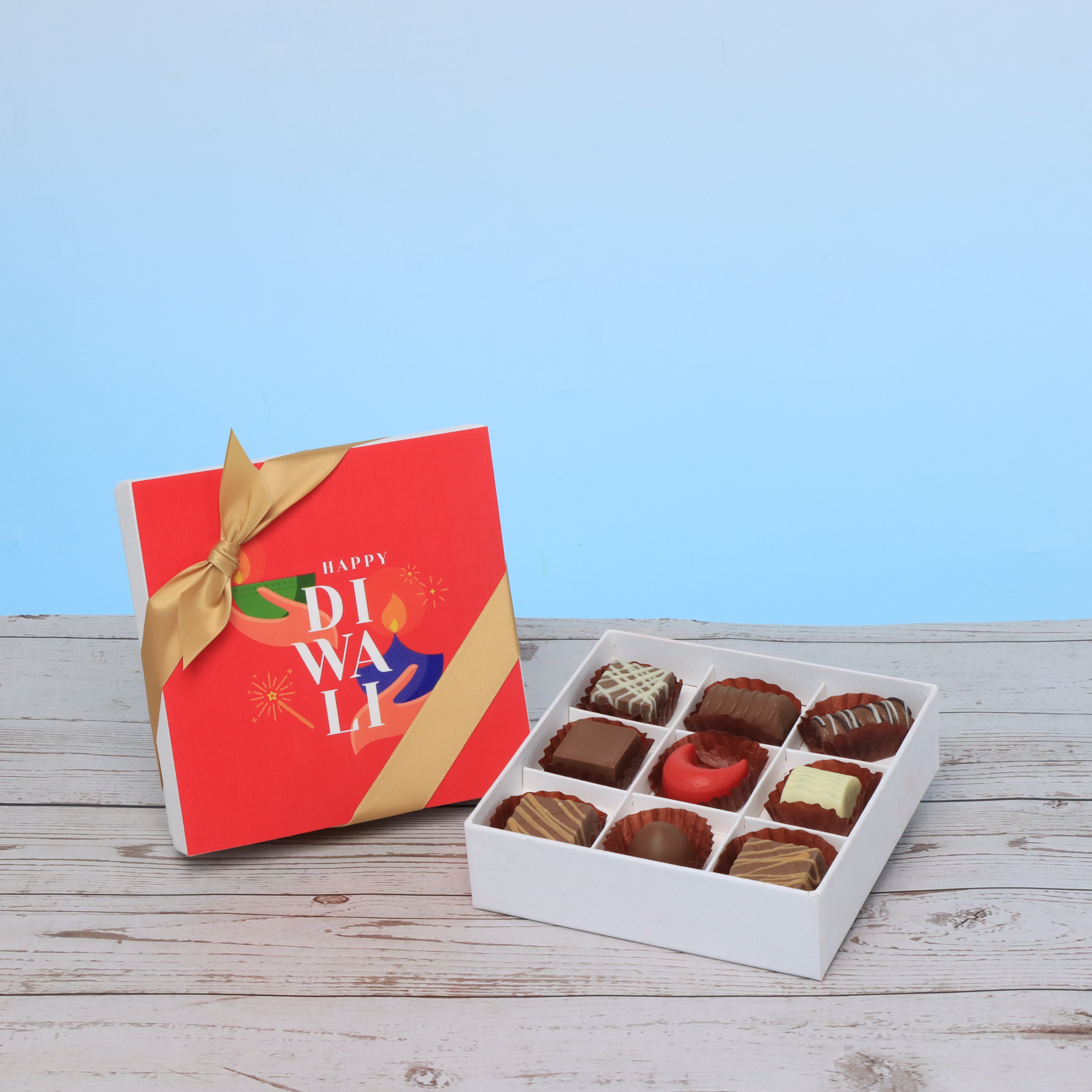 Happy diwali holding hands candle designed premium chocolate 9P hard box