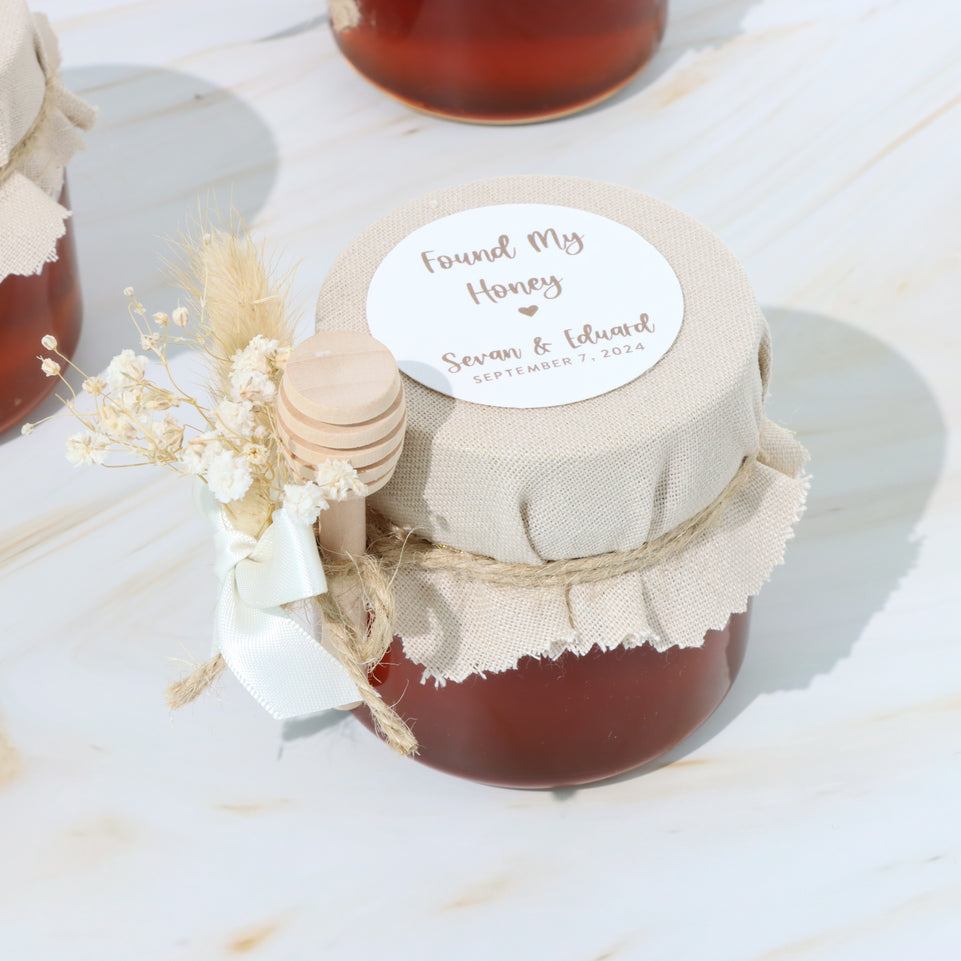 Rustic wedding decorated honey jar