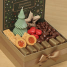 Season's Greeting designed with tree candle and decorated star premium chocolate & sweets medium hamper