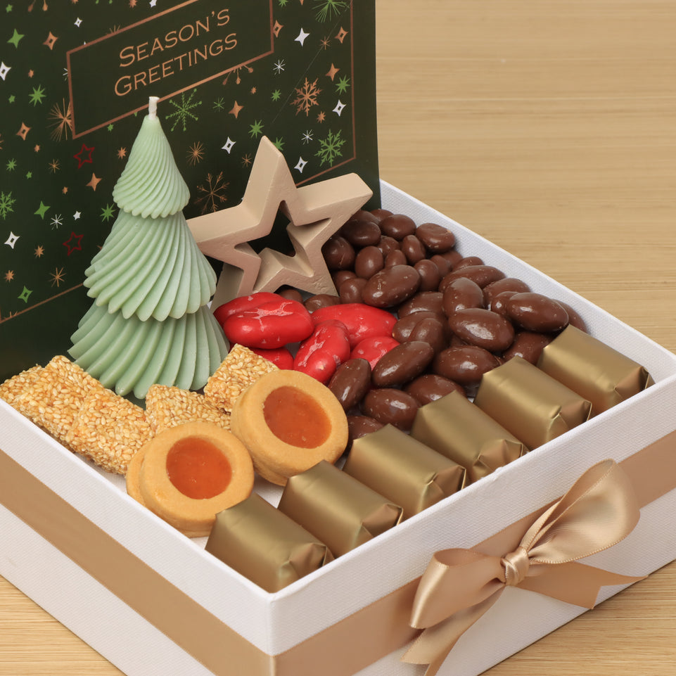 Season's Greeting designed with tree candle and decorated star premium chocolate & sweets medium hamper