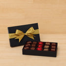 Premium chocolate 15-pc black hard box with gold ribbon