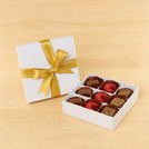 Premium chocolate 9-pc white hard box with gold ribbon