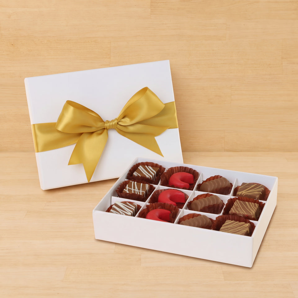 Premium chocolate 12-pc white hard box with gold ribbon