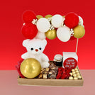 Valentine's decorated balloons, chocolate & sweets wooden tray