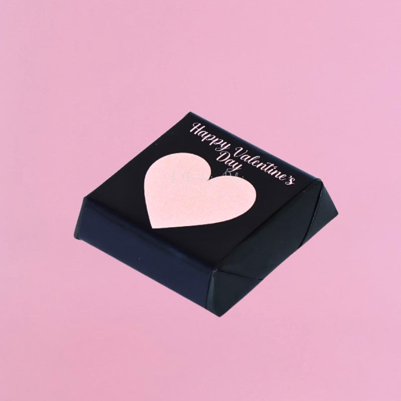 Happy valentine's pink heart designed chocolate