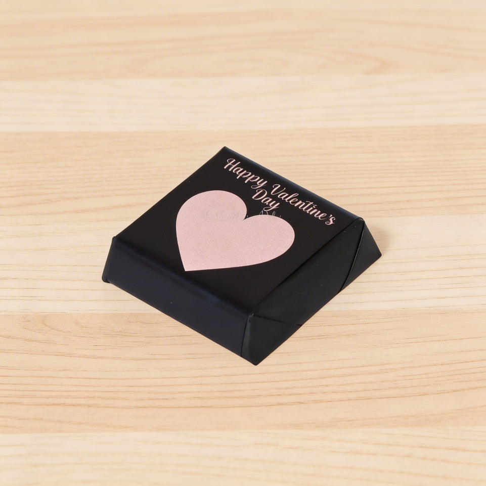 Happy valentine's pink heart designed chocolate