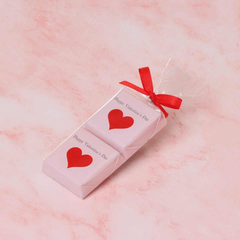 Happy valentines day designed premium chocolate transparent wrapped with ribbon giveaways