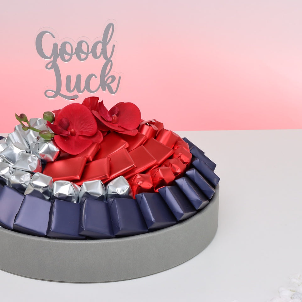 Good luck orchid decorated chocolate leather round tray