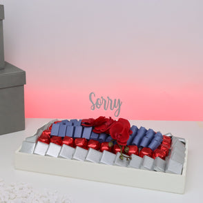 Sorry orchid decorated chocolate medi...