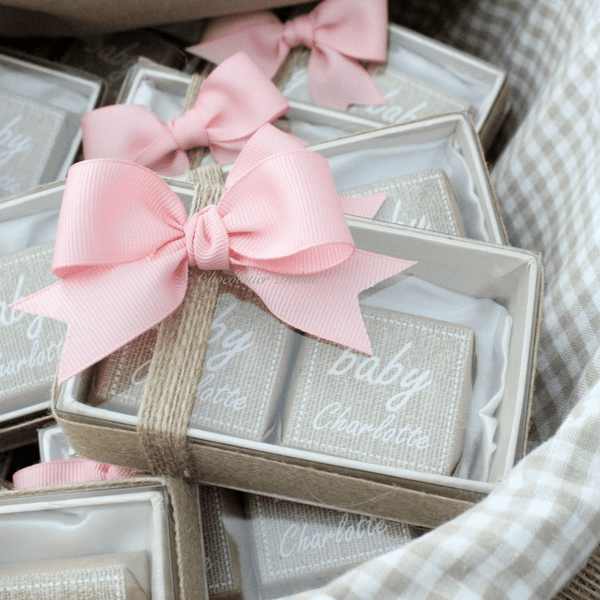 Baby girl rustic floral chocolate wood stand with personalized backdrop.