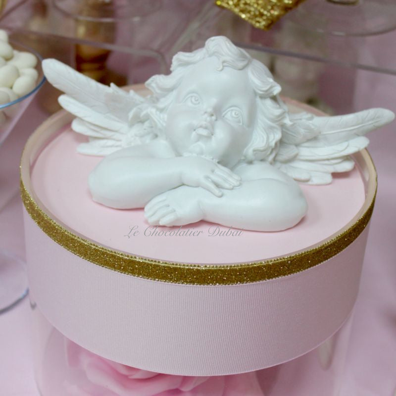 Baby girl angel theme dessert table