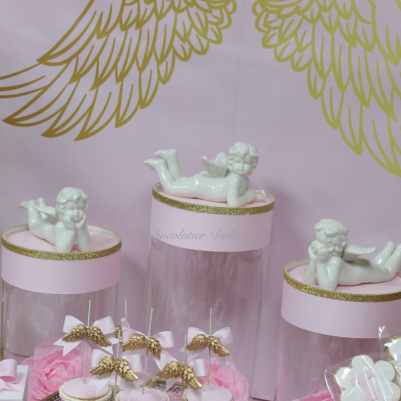 Baby girl angel theme dessert table