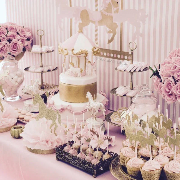 Baby girl carousel theme dessert table