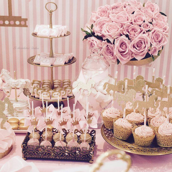 Baby girl carousel theme dessert table