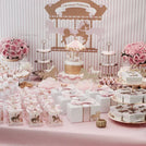 Baby girl carousel theme dessert table