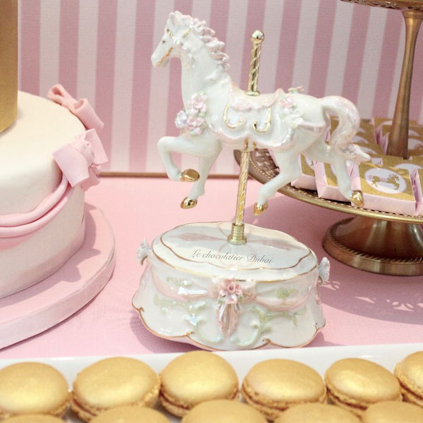 Baby girl carousel theme dessert table