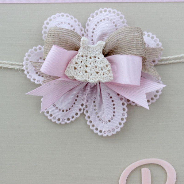 Baby rustic theme crochet decorated chocolate wood stand with customized backdrop.