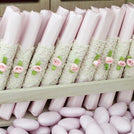 Baby rustic theme crochet decorated chocolate wood stand with customized backdrop.