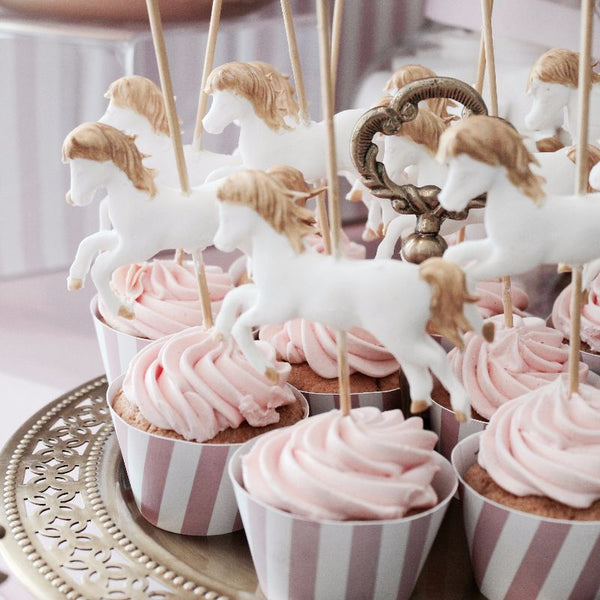 Baby girl carousel theme dessert table