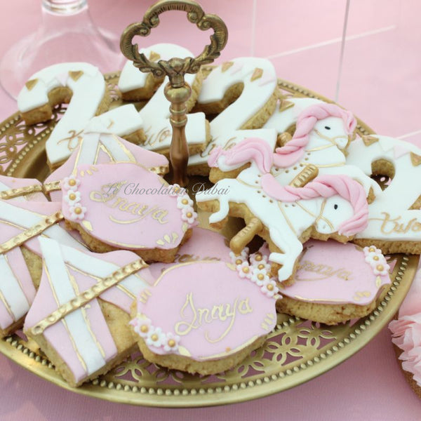 Baby girl carousel theme dessert table