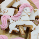 Baby girl carousel theme dessert table