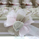 Baby rustic theme crochet decorated chocolate wood stand with customized backdrop.