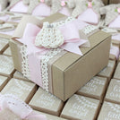 Baby rustic theme crochet decorated chocolate wood stand with customized backdrop.