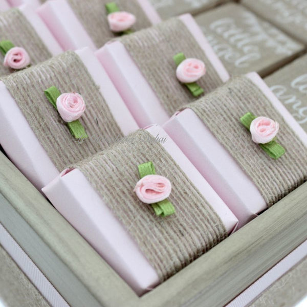 Baby rustic theme crochet decorated chocolate wood stand with customized backdrop.