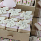 Baby rustic theme crochet decorated chocolate wood stand with customized backdrop.