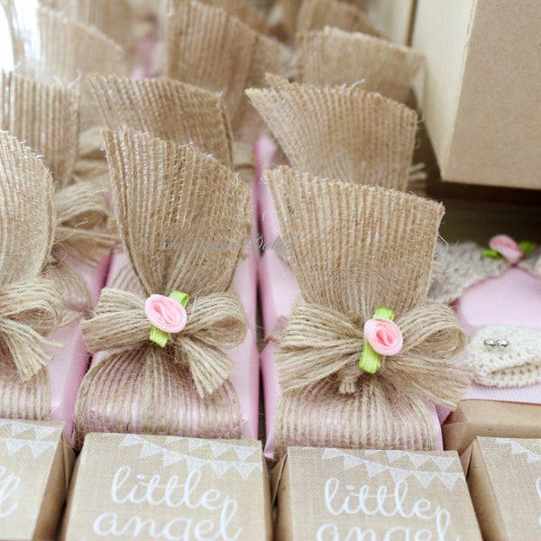 Baby rustic theme crochet decorated chocolate wood stand with customized backdrop.