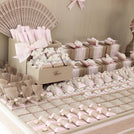 Baby rustic theme crochet decorated chocolate wood stand with customized backdrop.