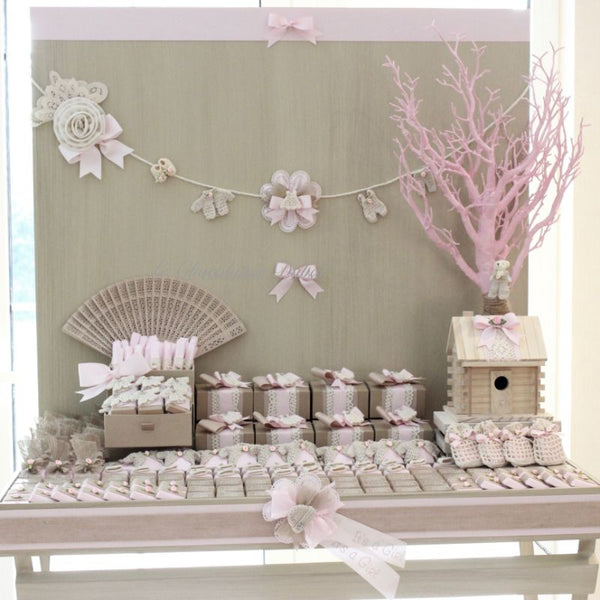 Baby rustic theme crochet decorated chocolate wood stand with customized backdrop.