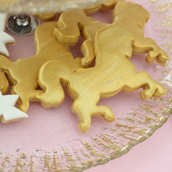 Baby girl carousel theme dessert table