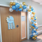 Baby boy carousel horse theme decorated chocolate wood stand with personalized backdrop